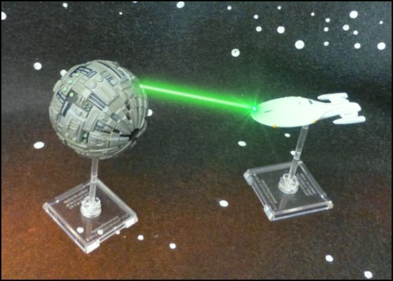 Le Voyager est pris dans le rayon tracteur d'une Sph�re Borg